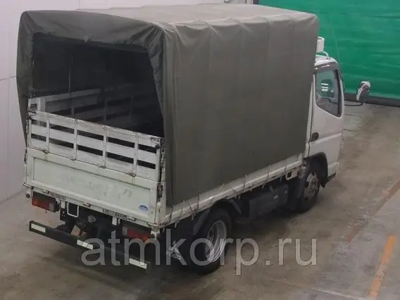 Тентованный грузовик Mitsubishi CANTER FE70D 2009 года б/у фото 2