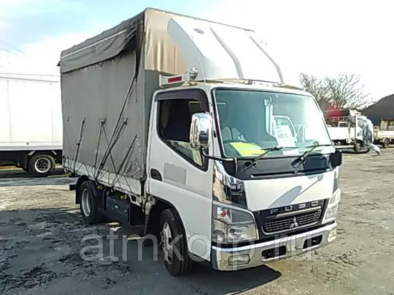 Тентованный грузовик Mitsubishi CANTER FE70D 2010 года б/у фото 2