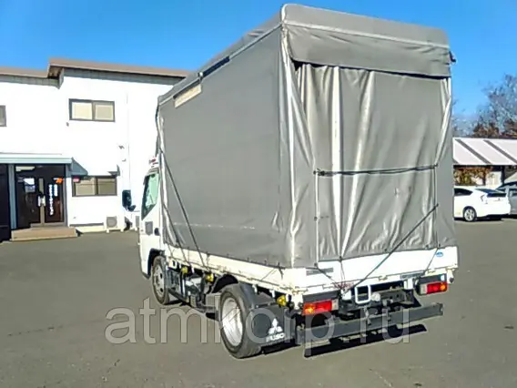 Тентованный грузовик Mitsubishi CANTER FE70D 2010 года б/у фото 5