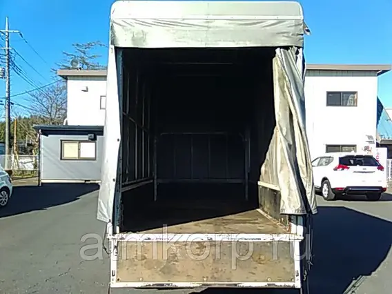 Тентованный грузовик Mitsubishi CANTER FE70D 2010 года б/у фото 7