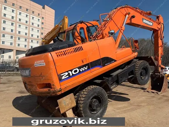Экскаватор Doosan DX210W 2011 года б/у фото 6