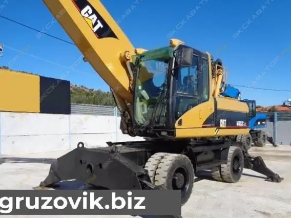 Экскаватор Caterpillar M322C MH 2003 года б/у фото 2