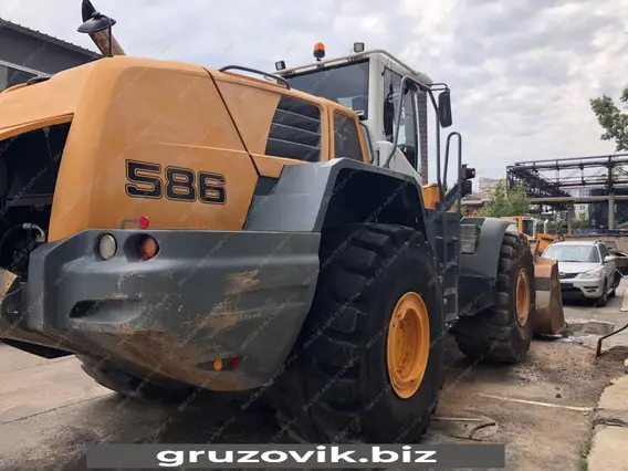 Фронтальный погрузчик Liebherr L 586 2plus2 2012 года б/у фото 6