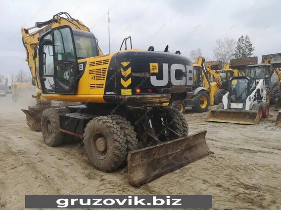 Экскаватор-погрузчик JCB JS 200W 2012 года б/у фото 4