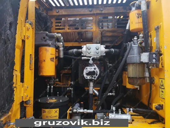 Экскаватор-погрузчик JCB JS 200W 2012 года б/у фото 6