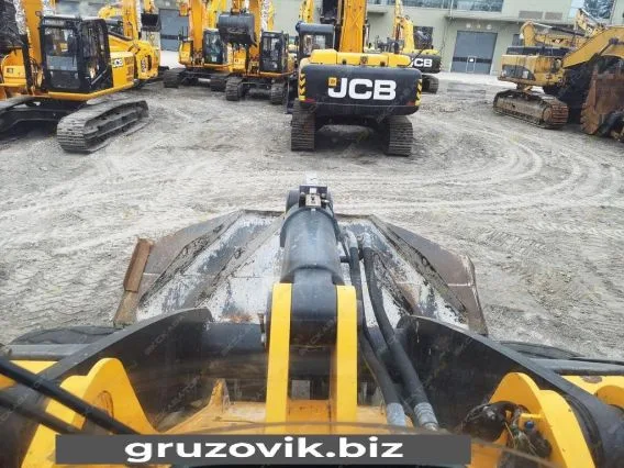 Фронтальный погрузчик JCB 456 ZX 2012 года б/у фото 7