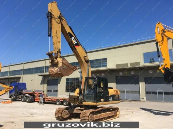 Экскаватор Caterpillar 320D 2012 года б/у