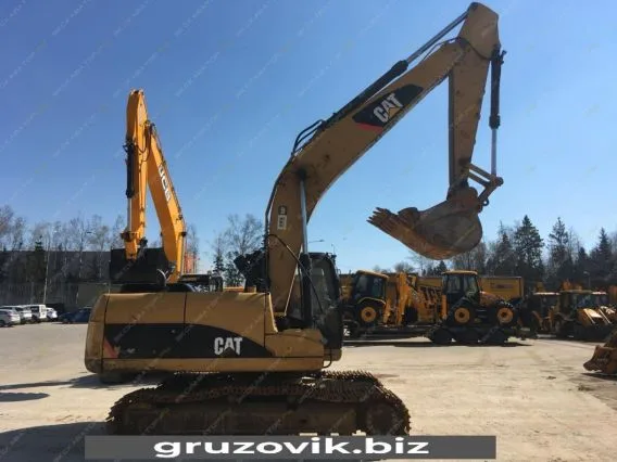 Экскаватор Caterpillar 320D 2012 года б/у фото 6