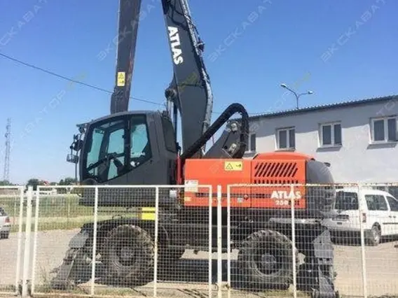 Экскаватор-погрузчик Atlas 250 MH 2015 года б/у