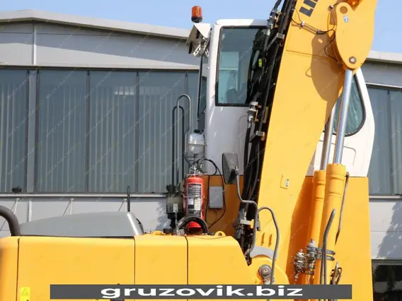 Экскаватор-погрузчик Liebherr A 904 Litronic 2011 года б/у