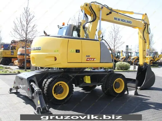 Экскаватор New Holland MH City 2009 года б/у