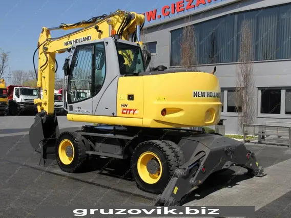 Экскаватор New Holland MH City 2009 года б/у фото 23