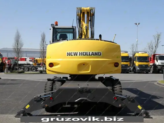 Экскаватор New Holland MH City 2009 года б/у фото 4