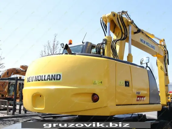 Экскаватор New Holland MH City 2009 года б/у фото 5
