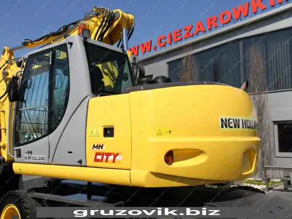 Экскаватор New Holland MH City 2009 года б/у фото 8