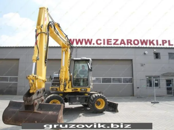 Экскаватор New Holland MH 3.6 2010 года б/у фото 12