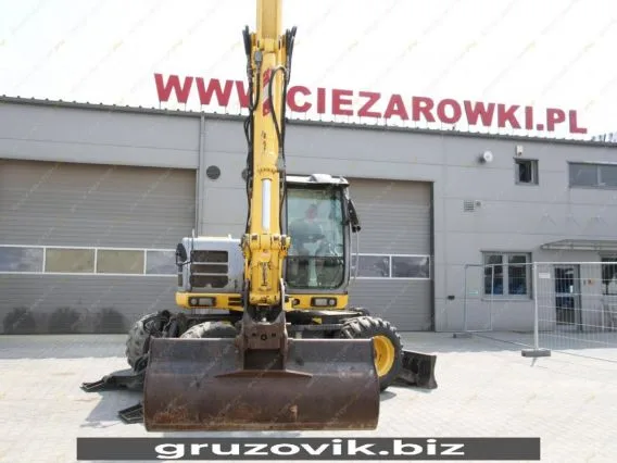 Экскаватор New Holland MH 3.6 2010 года б/у фото 14