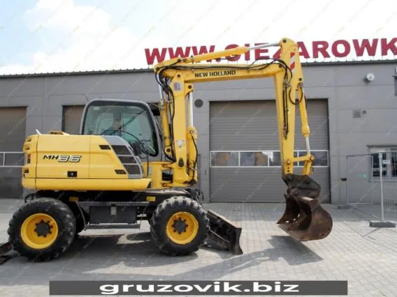 Экскаватор New Holland MH 3.6 2010 года б/у фото 15
