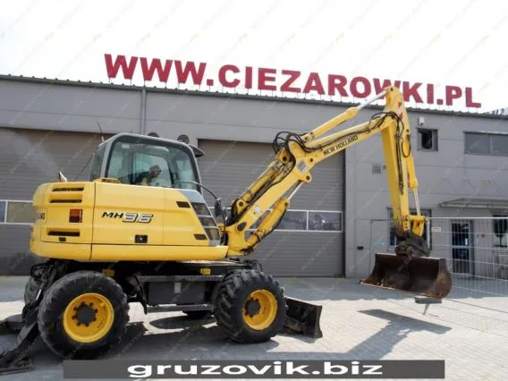 Экскаватор New Holland MH 3.6 2010 года б/у фото 16
