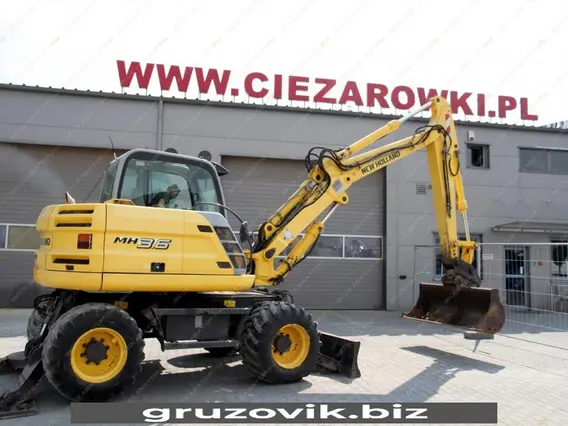 Экскаватор New Holland MH 3.6 2010 года б/у фото 16