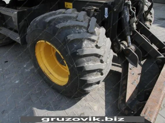 Экскаватор New Holland MH 3.6 2010 года б/у фото 17