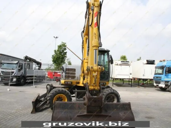 Экскаватор New Holland MH 3.6 2010 года б/у фото 18