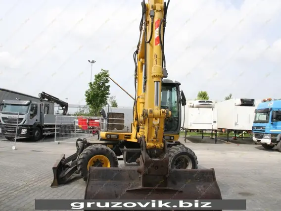 Экскаватор New Holland MH 3.6 2010 года б/у фото 18