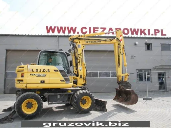 Экскаватор New Holland MH 3.6 2010 года б/у фото 20