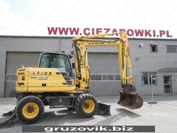 Экскаватор New Holland MH 3.6 2010 года б/у фото 20