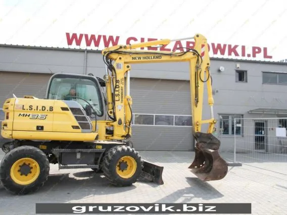 Экскаватор New Holland MH 3.6 2010 года б/у фото 21