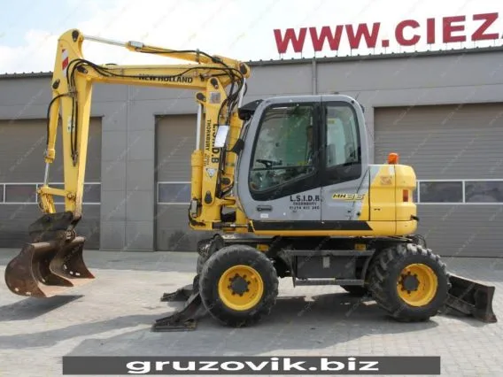 Экскаватор New Holland MH 3.6 2010 года б/у фото 23