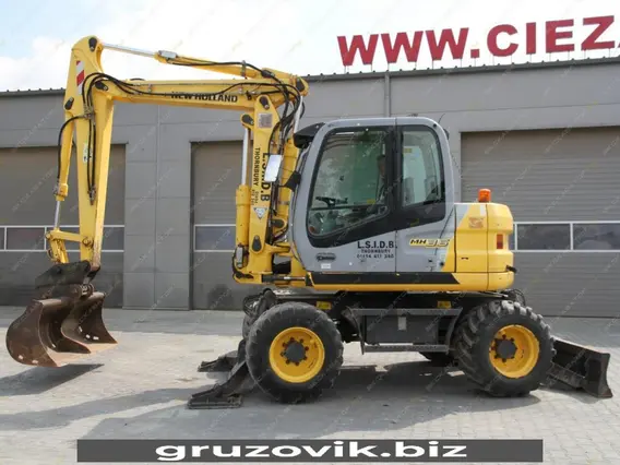 Экскаватор New Holland MH 3.6 2010 года б/у фото 23