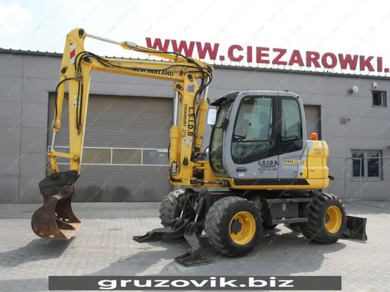 Экскаватор New Holland MH 3.6 2010 года б/у фото 24