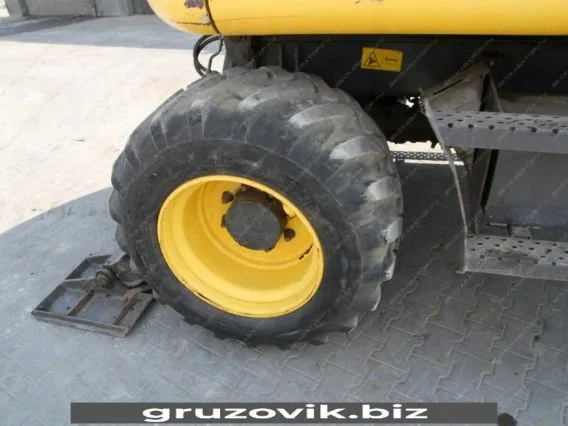 Экскаватор New Holland MH 3.6 2010 года б/у фото 7