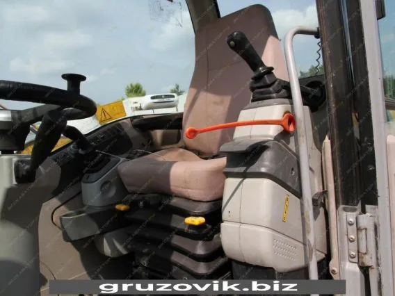 Экскаватор New Holland MH 3.6 2010 года б/у фото 8