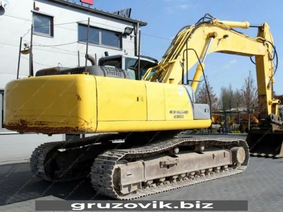 Экскаватор New Holland E385 2012 года б/у фото 11