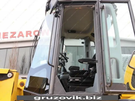 Фронтальный погрузчик New Holland W 190B 2011 года б/у фото 7