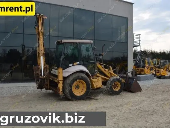 Экскаватор-погрузчик New Holland NH95-4PT 996 года б/у фото 3