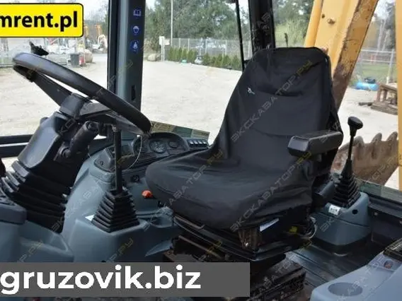 Экскаватор-погрузчик New Holland NH95-4PT 996 года б/у