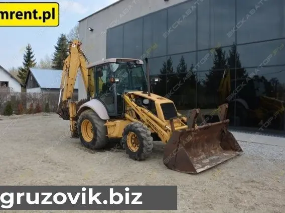 Экскаватор-погрузчик New Holland NH95-4PT 996 года б/у фото 13