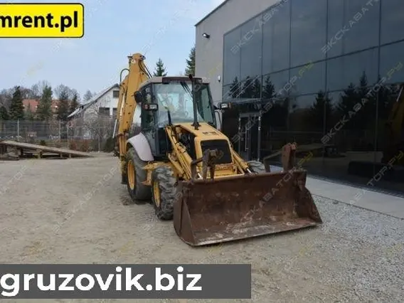 Экскаватор-погрузчик New Holland NH95-4PT 996 года б/у фото 14