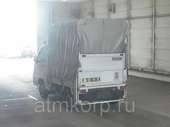 Тентованный грузовик SUBARU SAMBAR Truck TT1 2012 года б/у фото 4