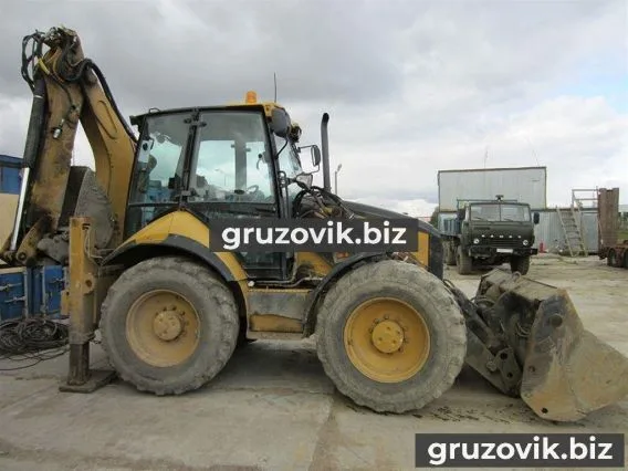 Экскаватор-погрузчик Caterpillar 444E 2006 года б/у