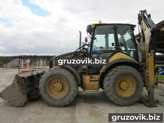 Экскаватор-погрузчик Caterpillar 444E 2006 года б/у фото 2