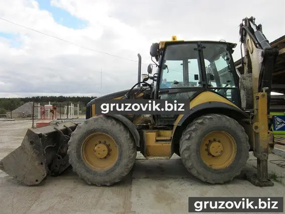 Экскаватор-погрузчик Caterpillar 444E 2006 года б/у фото 2