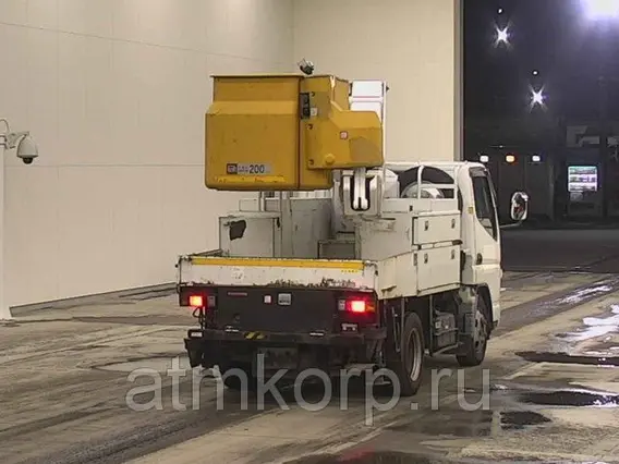 Автовышка Mitsubishi Canter кузов FG70EB 4х4 г 2003 вышка Aichi SH09A подъем люльки 12.2 м пробег 214 т.км 2019 года б/у фото 2