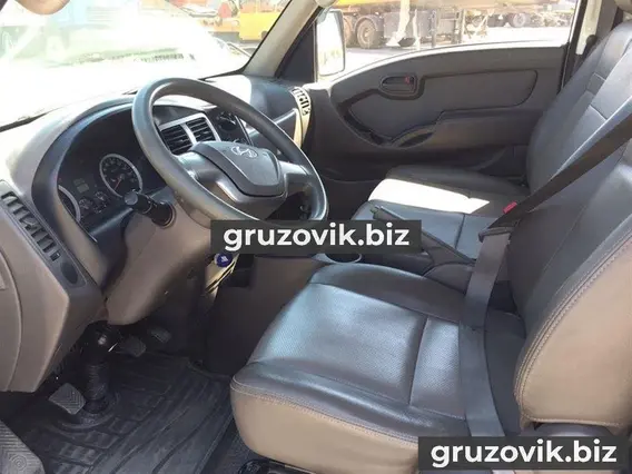 Тентованный грузовик Hyundai Porter II 2013 года б/у фото 7