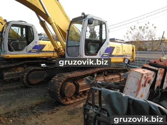 Экскаватор New Holland SK330 2006 года б/у