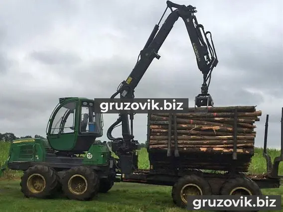 Лесовоз с КМУ John Deere 1010E 2009 года б/у