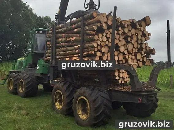 Лесовоз с КМУ John Deere 1010E 2009 года б/у фото 2